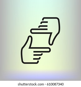 Human hands doing cropping symbol