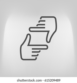 Human hands doing cropping symbol