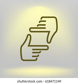 Human hands doing cropping symbol