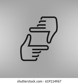 Human hands doing cropping symbol