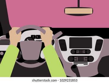 Human hands driving a car