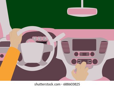 Human hands driving a car