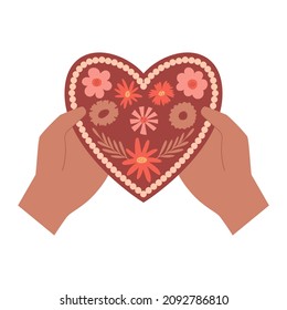 Human hands give a valentine card in the shape of a heart, with a floral pattern. A symbol of love, romance, gratitude. Boho Valentine's day. Color vector illustration isolated on a white background.