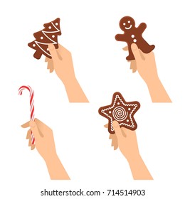 Human hands hold christmas sweet symbols: chocolate cookies, candy cane. Flat illustration of male and female hands with traditional xmas gifts: gingerman, star, new year tree. Vector design elements.