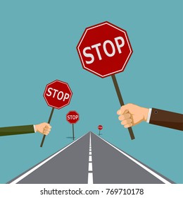 Human hands hold the road signs stop. Stock vector graphics.