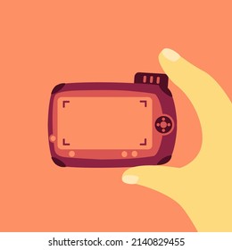 human Hands holding a digital camera on background. blank video flat design vector. take a picture cartoon isolated. photographer shooting or photograph photo or make a film. empty space viewfinder