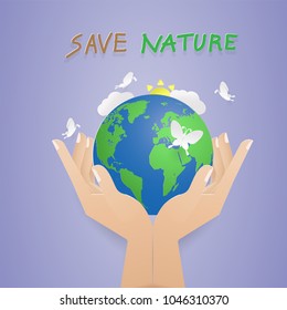 human hands holding world to save nature