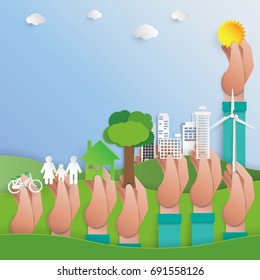 Human hands make green city.Let's save the world.Green city for ecological environment conservation.Paper art style vector illustration.