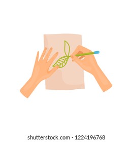 Human hands painting leaves on paper with green pencil. Hobby theme. Flat vector element for poster or flyer of art school