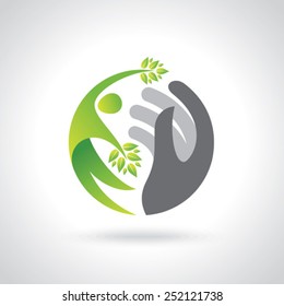 Human hands protecting green leaves, save earth concept.