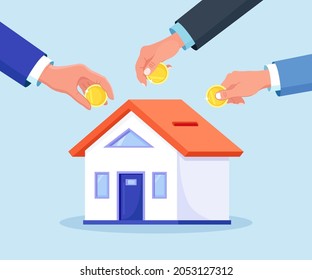 Human hands put coins in home is like a piggy bank. Tiny people buying house in debt. People investing money in property. Mortgage loan, ownership and savings. Real estate investment, house purchase