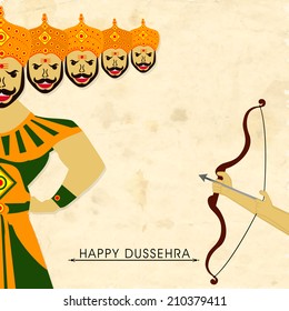 Human hands taking aim towards Ravana statue on occasion of Happy Dussehra festival celebrations. 