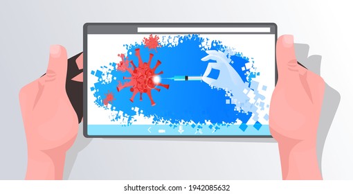 human hands using tablet with red influenza virus cells and syringe with coronavirus vaccine on screen