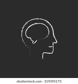 Human head with brain hand drawn in chalk on a blackboard vector white icon isolated on a black background.