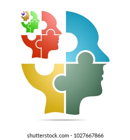 The human head composed of colored puzzle pieces with color head with gray shadow below the head on a white background. Human head composed of geometric elements 