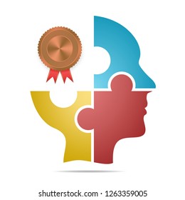 The human head composed of colored puzzle pieces with bronze labels and red ribbons and gray shadow below the head on a white background. Human head with world winning award medals 