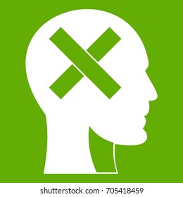 Human head with cross inside icon white isolated on green background. Vector illustration