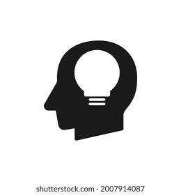 Human head with light bulb silhouette black vector illustration