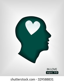 human head in love conceptual pictograph with heart symbol 