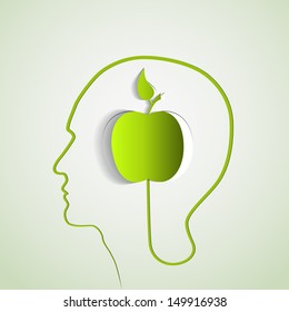 Human head with paper green apple - symbol Freedom and creativity