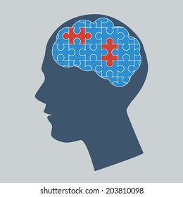 Human head with puzzle pieces