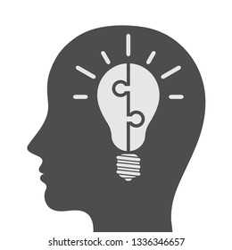 Human head silhouette with light bulb puzzle. Idea and creativity concept
