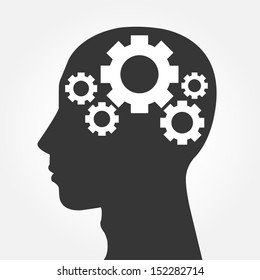 Human head silhouette with set of gears as a brain - idea and innovation concept