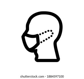 A human head wearing a medical mask seen in profile. Coronavirus. COVID-19
