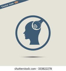 human head and a wrench with a nut