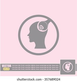 human head and a wrench with a nut