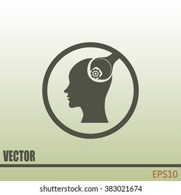 human head and a wrench with a nut