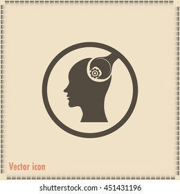human head and a wrench with a nut