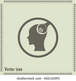 human head and a wrench with a nut