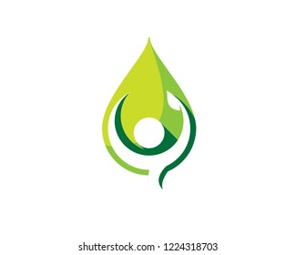 human holding leaf inside green big leaf