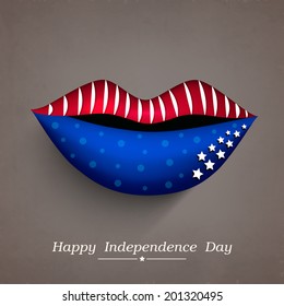 Human lips painted in national flag colors on grey background for American Independence Day celebrations. 