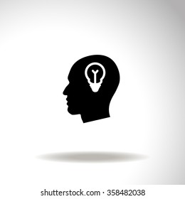 Human profile with bulb vector icon. Idea symbol.