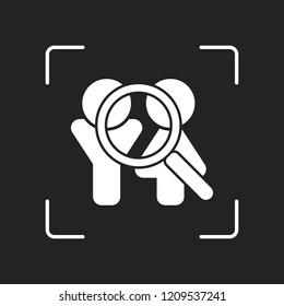 Human resources. Search teamgroup. Man, woman and magnifying symbols. White object in camera autofocus on dark background