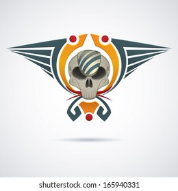 human skull surrounded by abstract wings on the sides