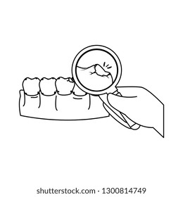 human teeth with magnifying glass