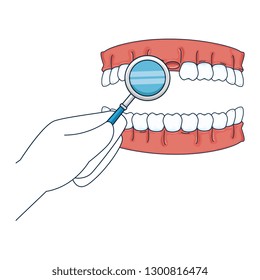 human teeth with magnifying glass