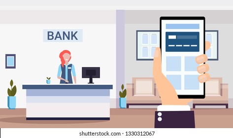 human using banking mobile application specialist at reception counter financial consulting center reception modern bank office interior horizontal flat