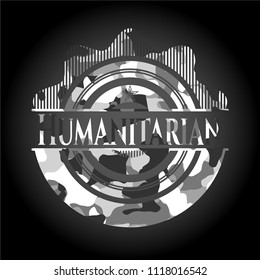 Humanitarian written on a grey camouflage texture