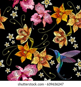 Humming bird, orchid exotic tropical flowers seamless pattern. Beautiful classical embroidery, humming-bird, orchids, tropical flowers. Template for clothes, embroideries, t-shirt design 