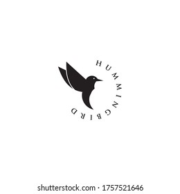 EL LOGO DEL VECTOR HUMMINGBIRD ESTÁ VOLANDO
