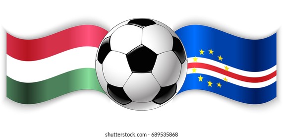 Hungarian and Cabo Verdean wavy flags with football ball. Hungary combined with Cape Verde isolated on white. Football match or international sport competition concept.