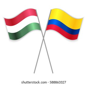Hungarian and Colombian crossed flags. Hungary combined with Colombia isolated on white. Language learning, international business or travel concept.