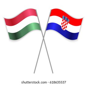 Hungarian and Croatian crossed flags. Hungary combined with Croatia isolated on white. Language learning, international business or travel concept.