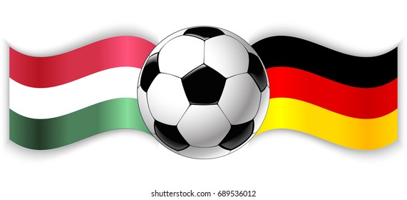 Hungarian and German wavy flags with football ball. Hungary combined with Germany isolated on white. Football match or international sport competition concept.