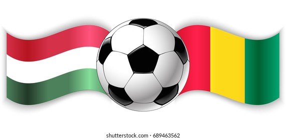 Hungarian and Guinean wavy flags with football ball. Hungary combined with Guinea isolated on white. Football match or international sport competition concept.