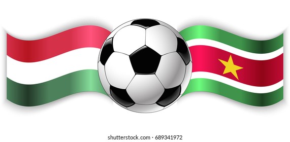 Hungarian and Surinamese wavy flags with football ball. Hungary combined with Suriname isolated on white. Football match or international sport competition concept.